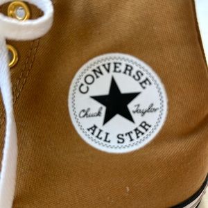Brand new. Worn once. Converse high top